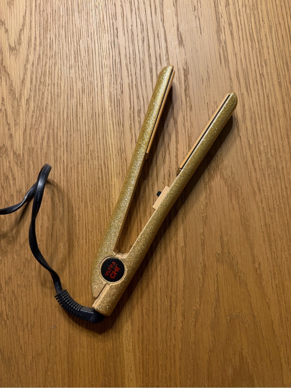 Ultra CHI 1” ceramic flat iron in a fun gold glitter finish